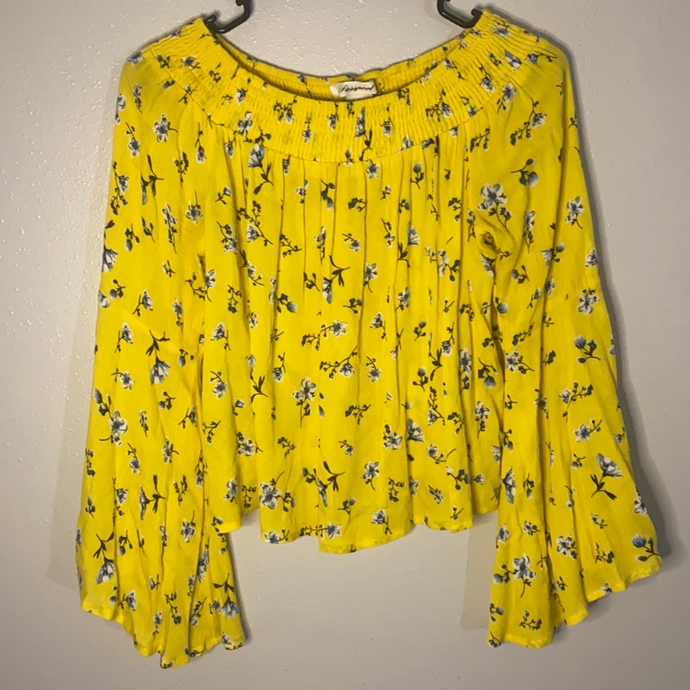 Yellow, floral blouse. Size medium. Flared sleeves. Very new.